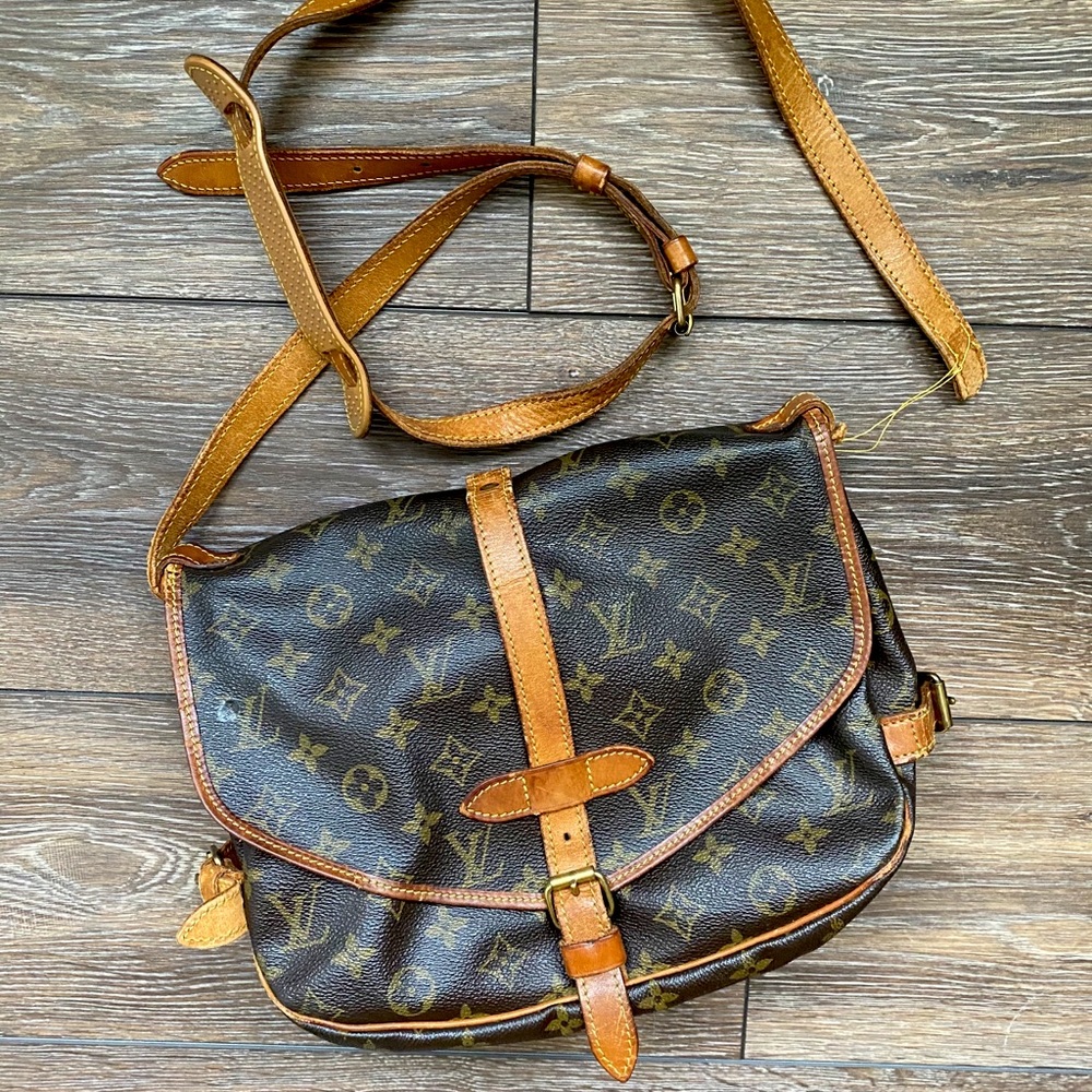 LouisVuitton SaumurCrossbody authenticated by EBTH